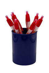 Red pens in blue pen holder