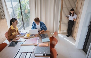 group of business people LGBTQ+ Diverse Team meeting collaborating new project in office
