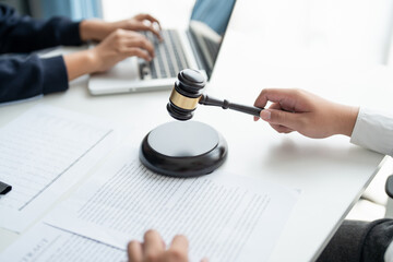 Lawyer businessman working with lawbook in office or courtroom Legal counsel with gavel and legal...