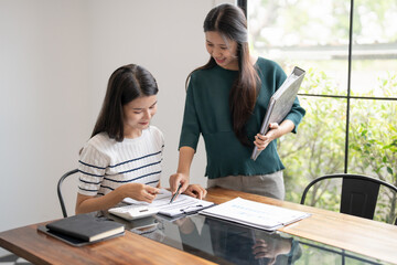 Fototapeta premium Asian Business woman Meeting Design Ideas professional investor working new start up project. businesswoman working together meeting concept