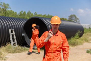 Industry Engineers Walking Inside Circular water Pipe. Engineering or Worker inspection pipe...