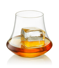 Glass scotch whiskey or rum and one big piece ice isolated on white background with clipping path