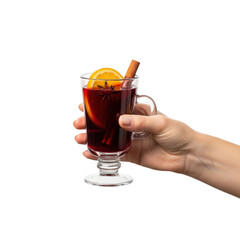 A hand holds a clear glass mug filled with spiced mulled wine, garnished with orange, cinnamon, and star anise. Ideal for winter, holiday, and cozy themes.