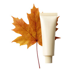 Cream Tube Next to Autumn Leaf Isolated on White Background for Natural Beauty and Skin Care Concepts