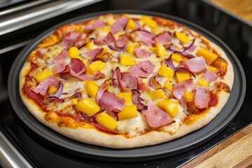 Delicious freshly baked pizza topped with savory ham, sweet mango chunks, red onions, and melted cheese on a wooden platter ready to serve