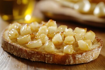 Delicious Freshly Toasted Bread with Sweet Golden Caramelized Onions Served on a Rustic Wooden Table Ideal for Food Photography and Culinary Blogs