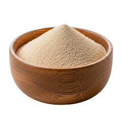 A close up of dry active yeast granules mounded in a round wooden bowl, essential for baking bread and pastries and other culinary uses.