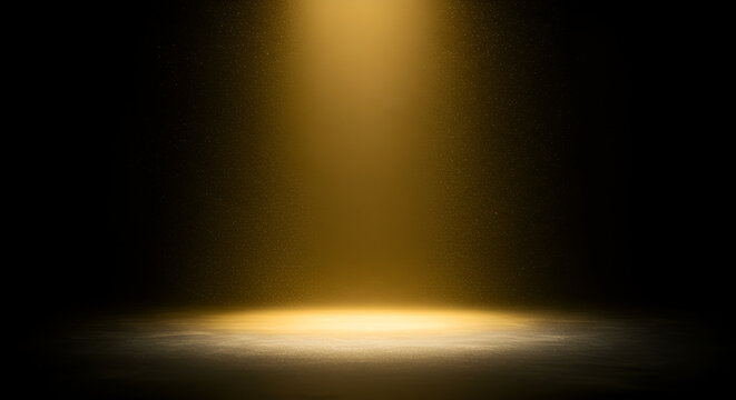 Golden spotlight on a dark stage