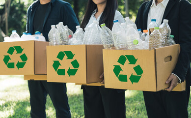 Recycling and volunteer portrait of group doing outdoor waste and garbage cleaning. Earth day, charity and community clean up project.