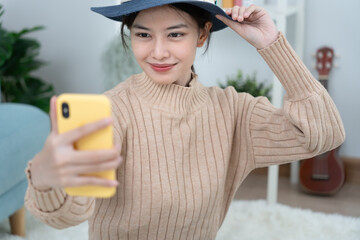 Traveler, travel bag. Portrait asian beautiful girl selfie and feel relax during bag pack. Pack...