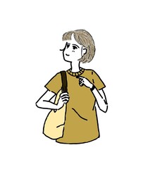 a woman standing in a yellow dress