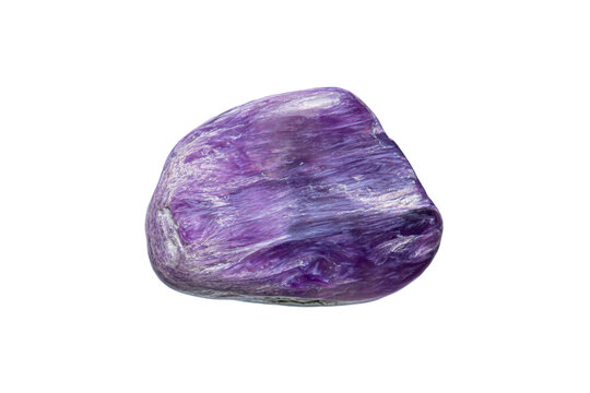 Closeup rare charoite gemstone on white background (silicate group)(selective focus)