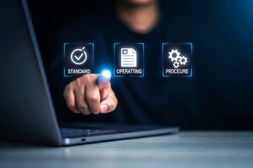 Person touching screen with icons for standard operating procedure and compliance