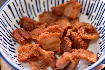 Deep fried crispy pork belly, Crispy Fried Pork Belly with Chili Sauce, Deep fried crispy pork belly sliced cooked with salt and Thai spicy dipping sauce