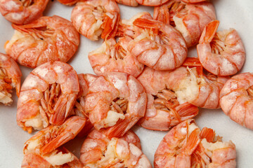 A pile of shrimp on a white plate