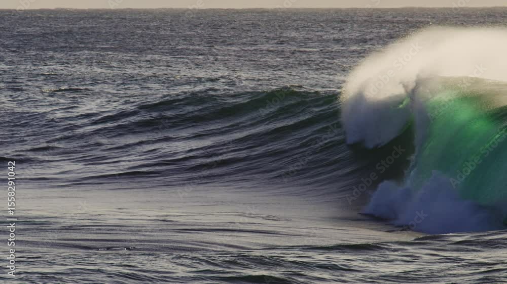 Poster ocean wave cresting and rolling with dynamic energy, coastal nature in slow motion, natural backdrop