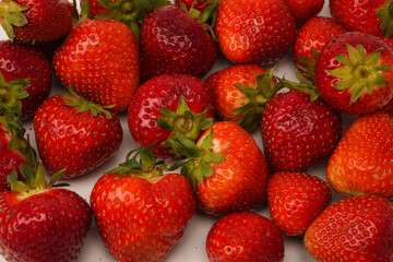 Fresh group of berries isolated on a white background.