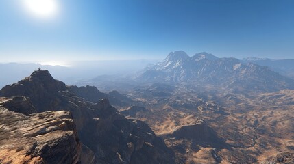 Obraz premium A panoramic view of a vast, arid mountain range under a bright sun, showcasing rocky peaks, hazy valleys, and a distant, snow-capped mountain