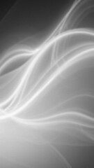 Abstract grayscale image featuring curved blurred white lines against a dark background Subtle gradient adds depth to