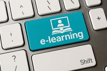 Teal e learning key on a computer keyboard e-learning technology