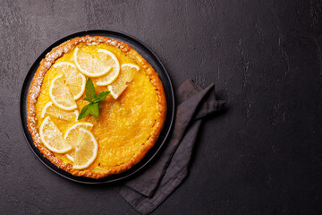 Delicious lemon tart with golden crust and smooth, glossy lemon filling