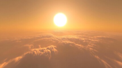 Golden sun above a sea of clouds at sunset, creating a warm, serene atmosphere