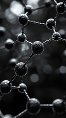 Close-up view of dark, interconnected molecular structure, with blurred background