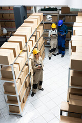 Industrial workspace supporting supply chain process to organize boxes and prepare shipments for...