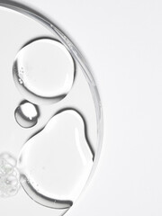 Transparent liquid skincare swatch , cosmetic serum or toner droplet resting on glass for clarity, moisture, and contemporary beauty
