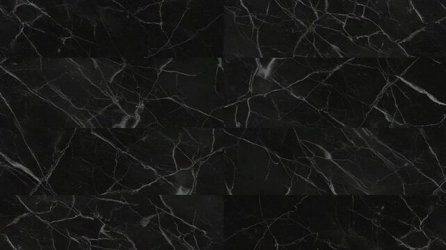 Black marble texture with white veining in a seamless pattern  
