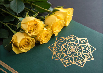 yellow roses on a wooden background