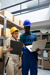 Factory operations rely on diverse warehouse team who handle products on racks, overseeing order...