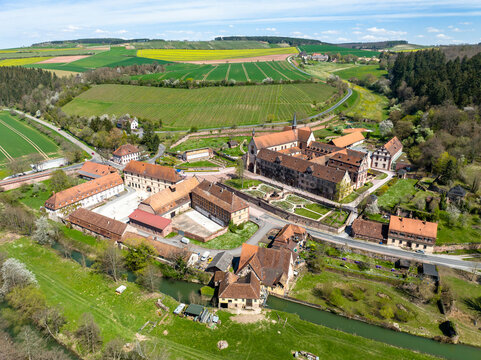 Germany, Baden-Wurttemberg, Wertheim, Aerial view of Bronnbach Monastery and surrounding landscape