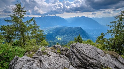 Obraz premium Panoramic mountain vista, rocky outcrop, evergreen trees, valley below, dramatic cloudscape