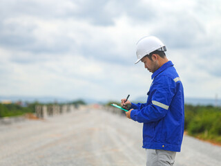 Constructor Engineer Man Using tablet Construction Site