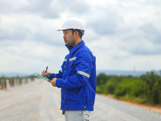 Constructor Engineer Man Using tablet Construction Site