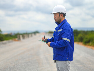 Constructor Engineer Man Using tablet Construction Site