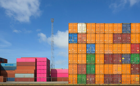 Stacked shipping containers at Rotterdam harbour container terminal