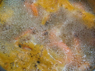 Cooking shrimp at home in a saucepan. Texture