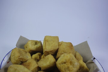 Fried tofu is a side dish that is often eaten by Indonesian people.