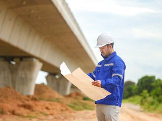 Back one architect standing outdoor at home building construction site