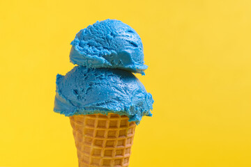 Double Scoop of Vibrant Blue Bubble Gum Ice Cream in a Waffle Cone