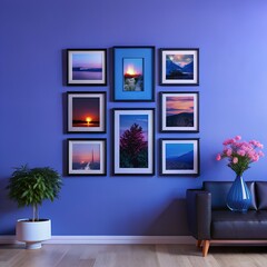 A modern living room features a black leather sofa against a deep blue wall showcasing a gallery of landscape photographs