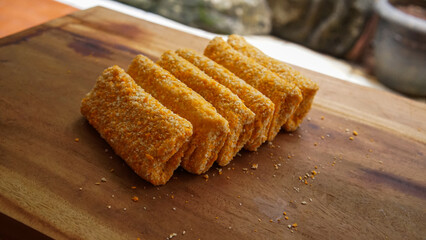 Rolls filled with smoked beef, mayonnaise, omega eggs and cheese. Delicious street food. Risol...