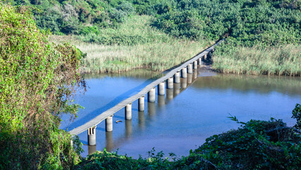 Hiking Path Wood Bridge Over Wetland Lagoon River Water.