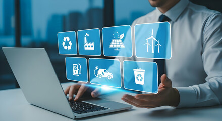 Businessman interacts with virtual icons of sustainable energy and recycling, displayed over a laptop