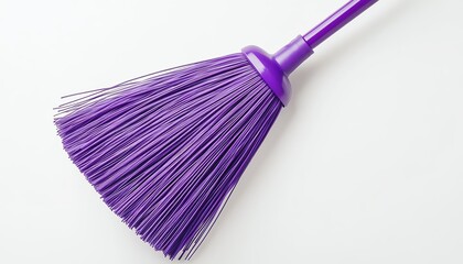 Bright purple broom for cleaning tasks.