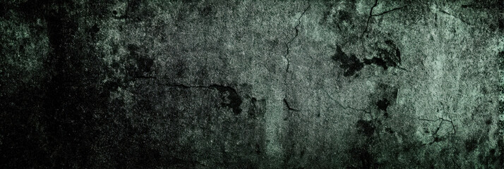 Obraz premium Eerie wall covered in scratches with a dark and grungy cement texture