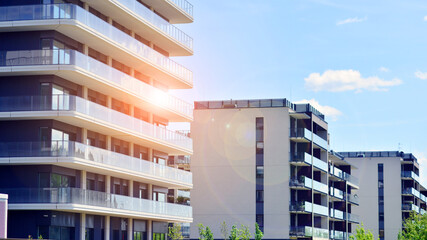 Modern apartment buildings on a sunny day with a blue sky. Facade of a modern apartment building....