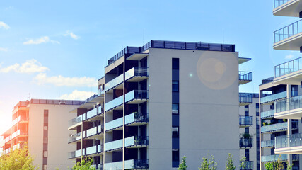 Modern apartment buildings on a sunny day with a blue sky. Facade of a modern apartment building. Modern residential apartment building complex condo.